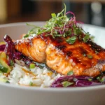 Hot honey salmon bowl with rice and veggies